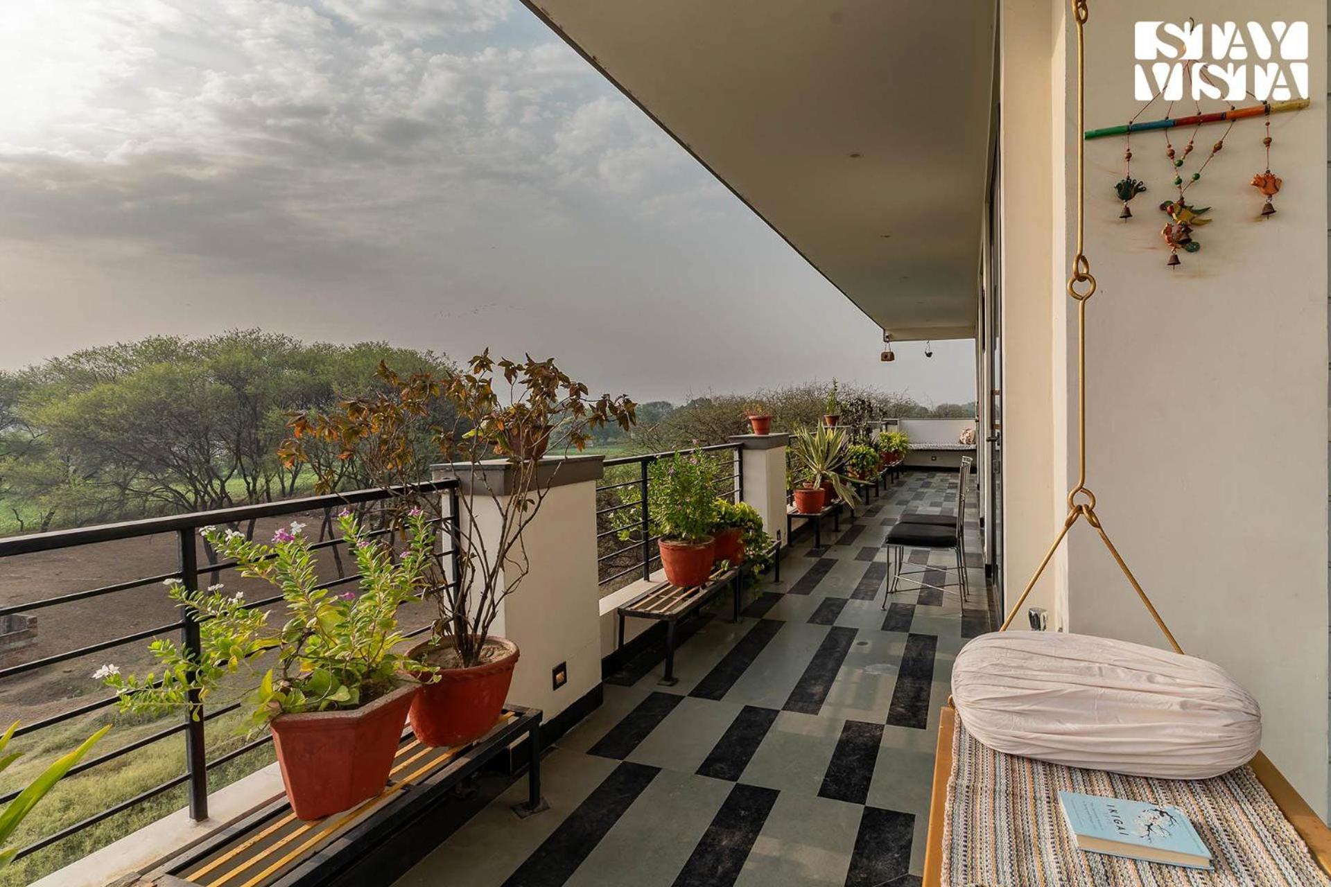Villa Serenity By The Ganges With Alfresco Dining At By Stayvista *